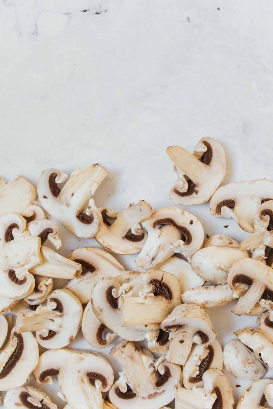 Sliced mushrooms, the raw ingredient behind functional mushroom supplements and coffee
